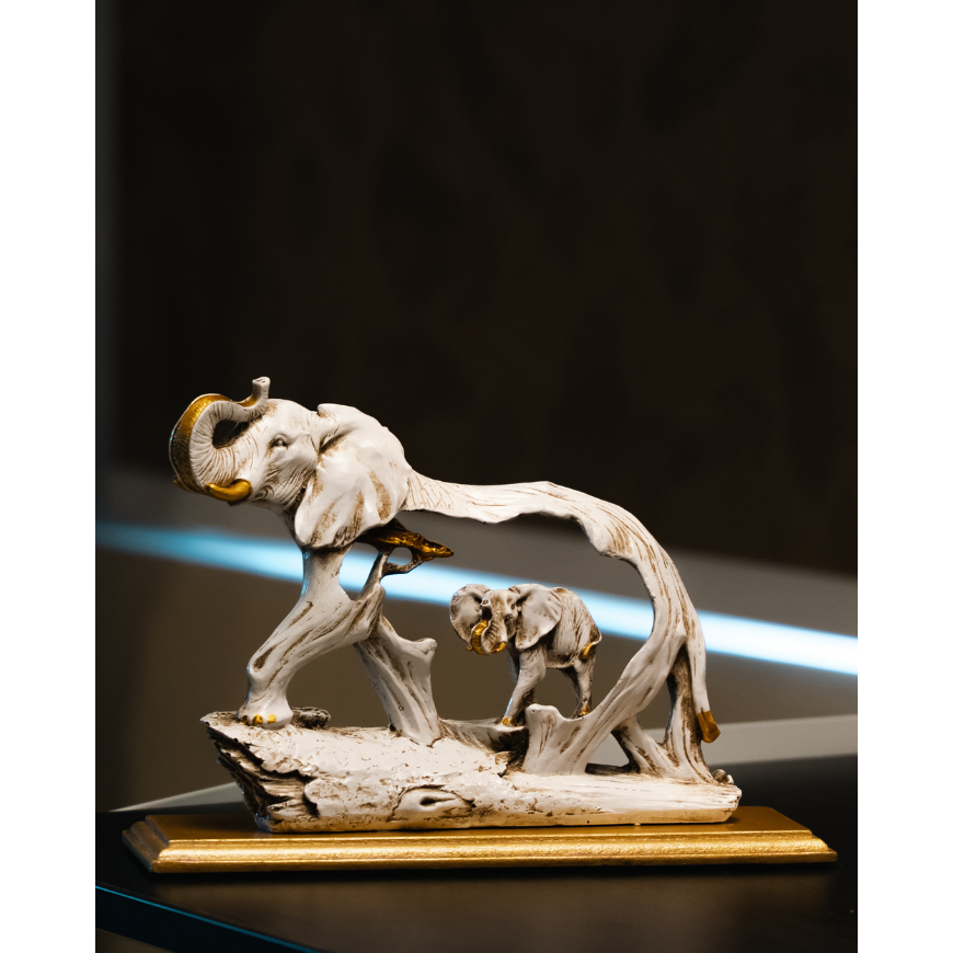 Lucky Raised Tusk Elephant - madsbox
